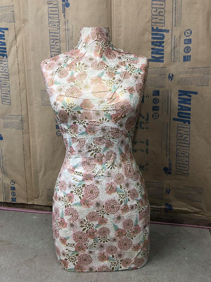 Mannequin covered with decorative tissue paper. Thejunkparlor.com