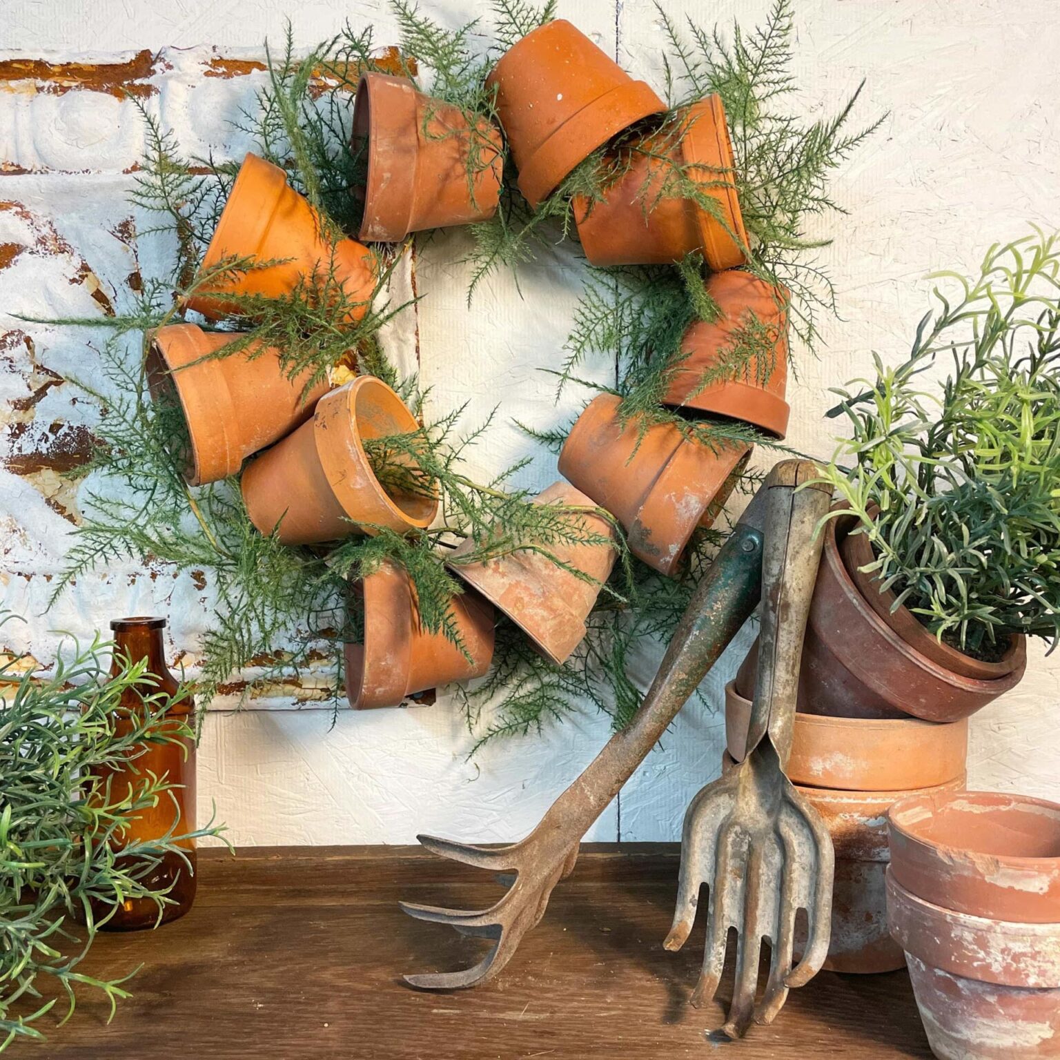 https://thejunkparlor.com/wp-content/uploads/2021/07/Terracotta-Wreath-Junk-Parlor-scaled-1-1536x1536.jpeg