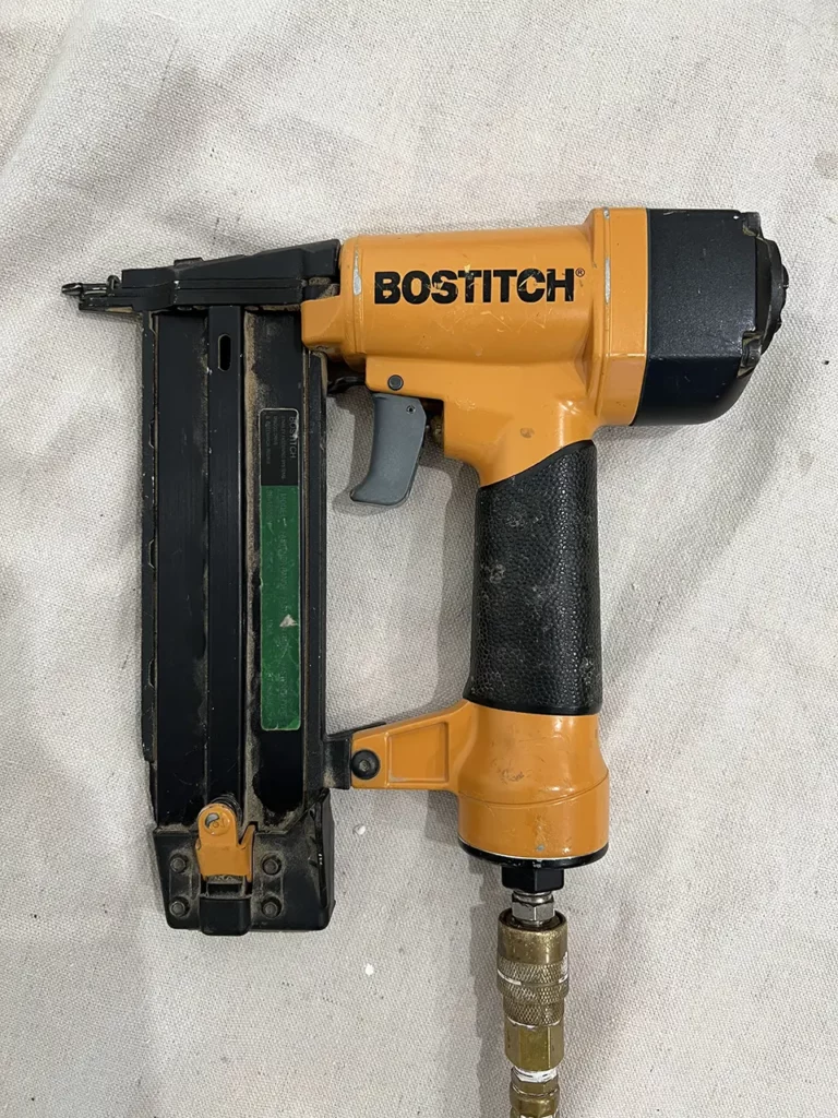 Neighbor's nail gun Bostitch.  Brooke Johnson | The Junk Parlor | Old stuff and cool junk for your home | Business Coach for Antique Dealers | thejunkparlor.com