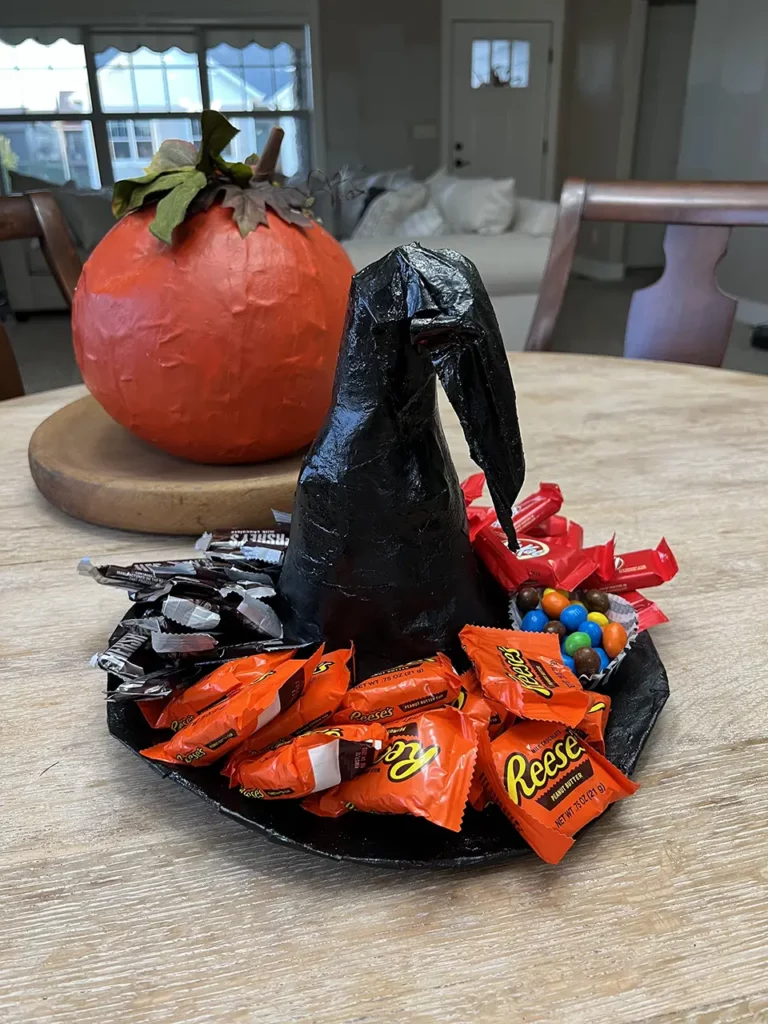 witches hat styled as a candy platter or candy board. Perfect for a Halloween party. Brooke Johnson | The Junk Parlor | Old stuff and cool junk for your home | Business Coach for Antique Dealers | thejunkparlor.com