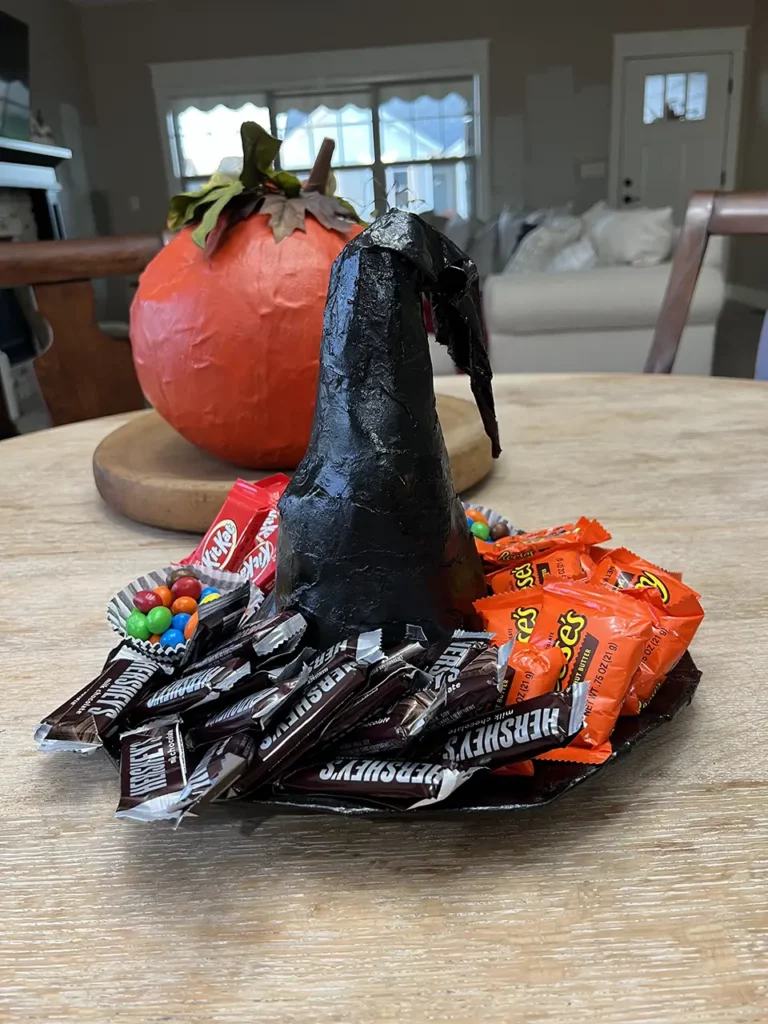 witches hat styled as a candy platter or candy board. Perfect for a Halloween party. Brooke Johnson | The Junk Parlor | Old stuff and cool junk for your home | Business Coach for Antique Dealers | thejunkparlor.com