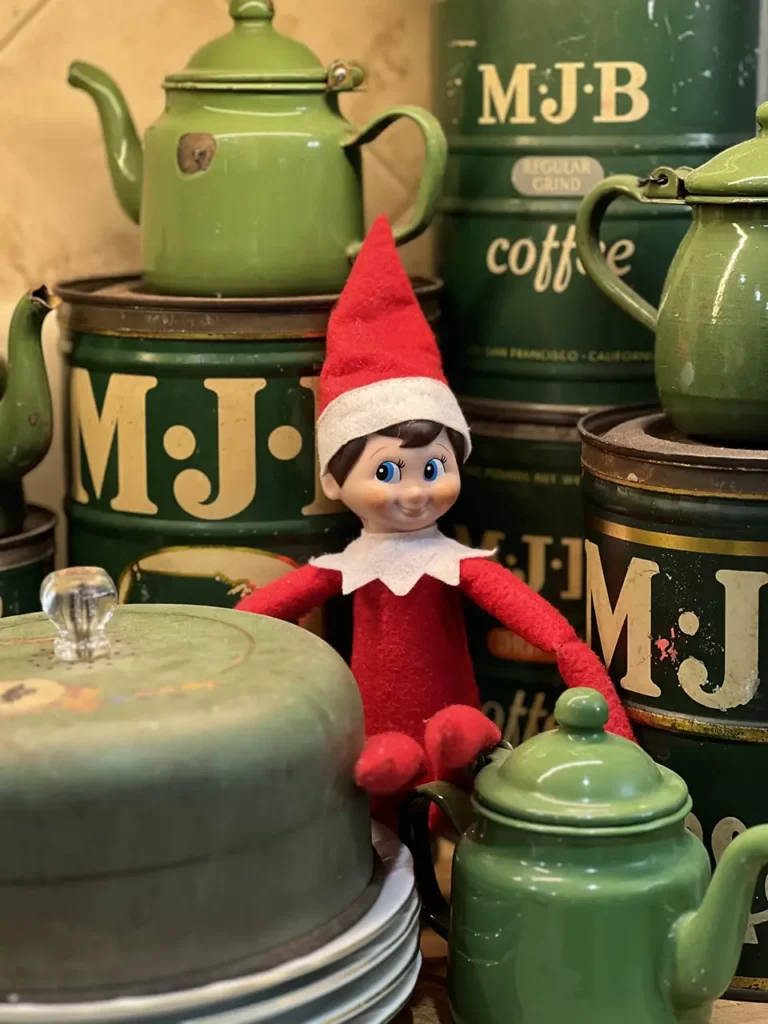 MJB tins, green enamel miniature tea pots and our Elf on the Shelf.