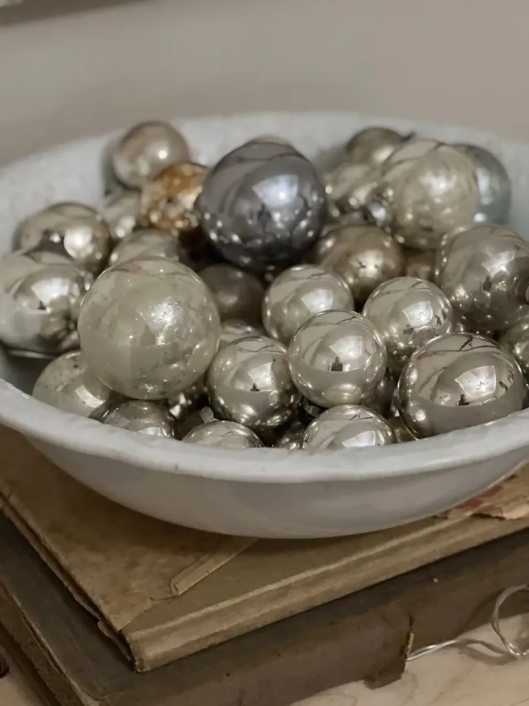 Ironstone bowl of silver shiny brites.