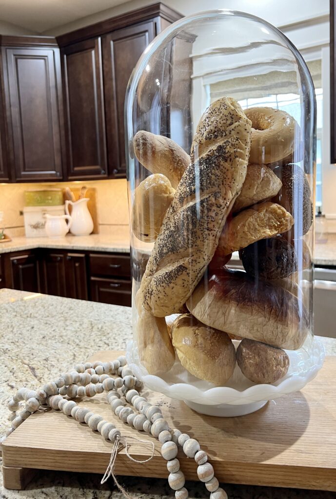Large cloche in a kitchen covering bread