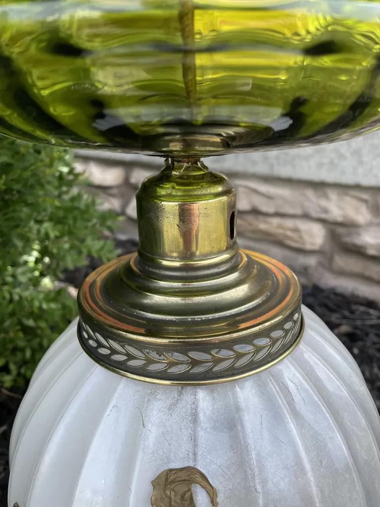 Up close of the vintage lamp globe garden totem