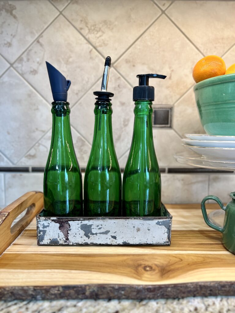 3 bottles with three different spouts