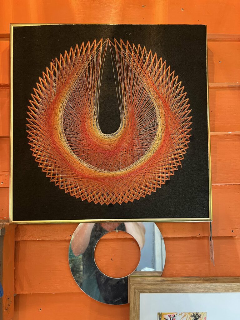 orange string art at E's Emporium