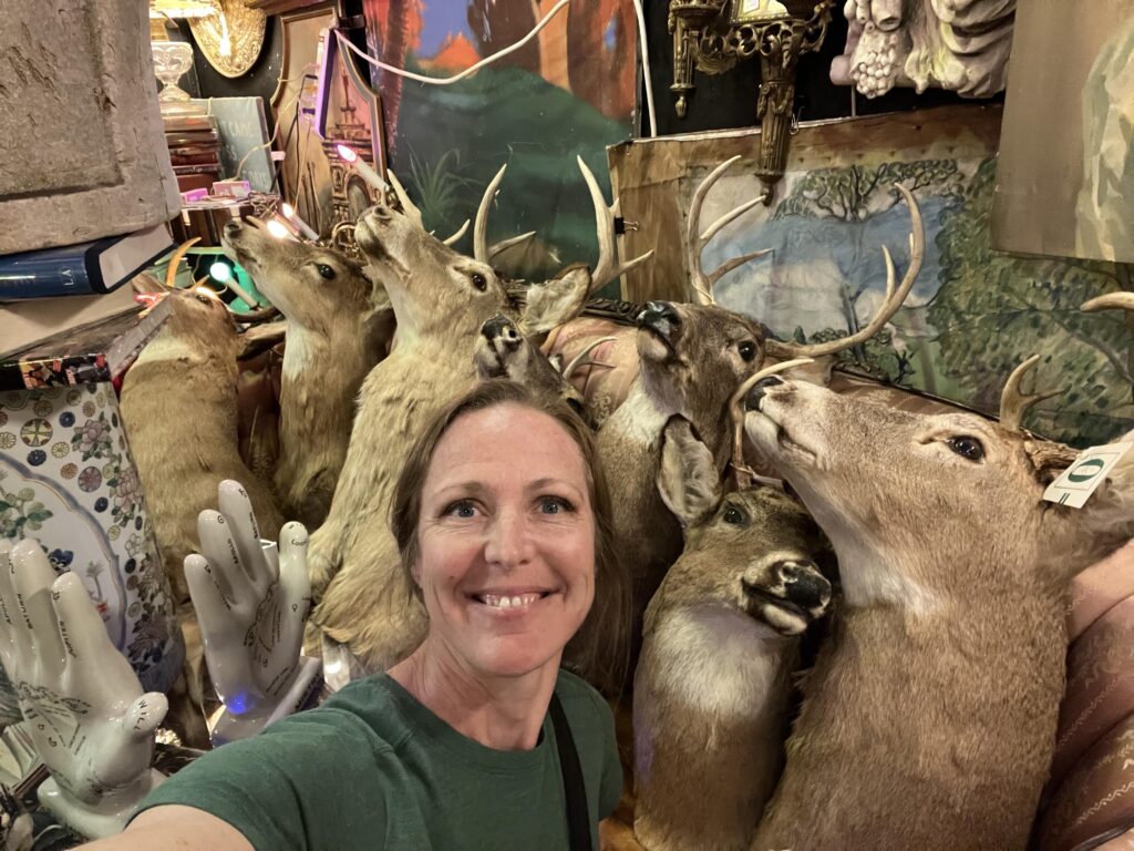 me in front of deer heads