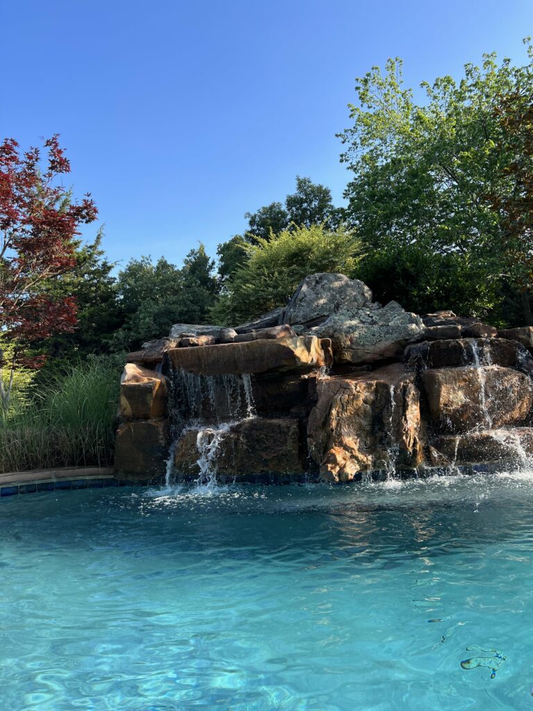 Kim's beautiful waterfall to her pool