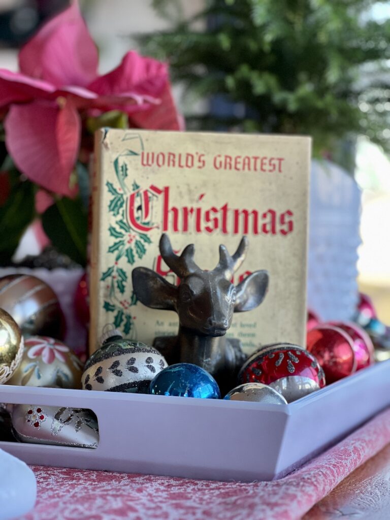 Christmas book and brass deer bookend