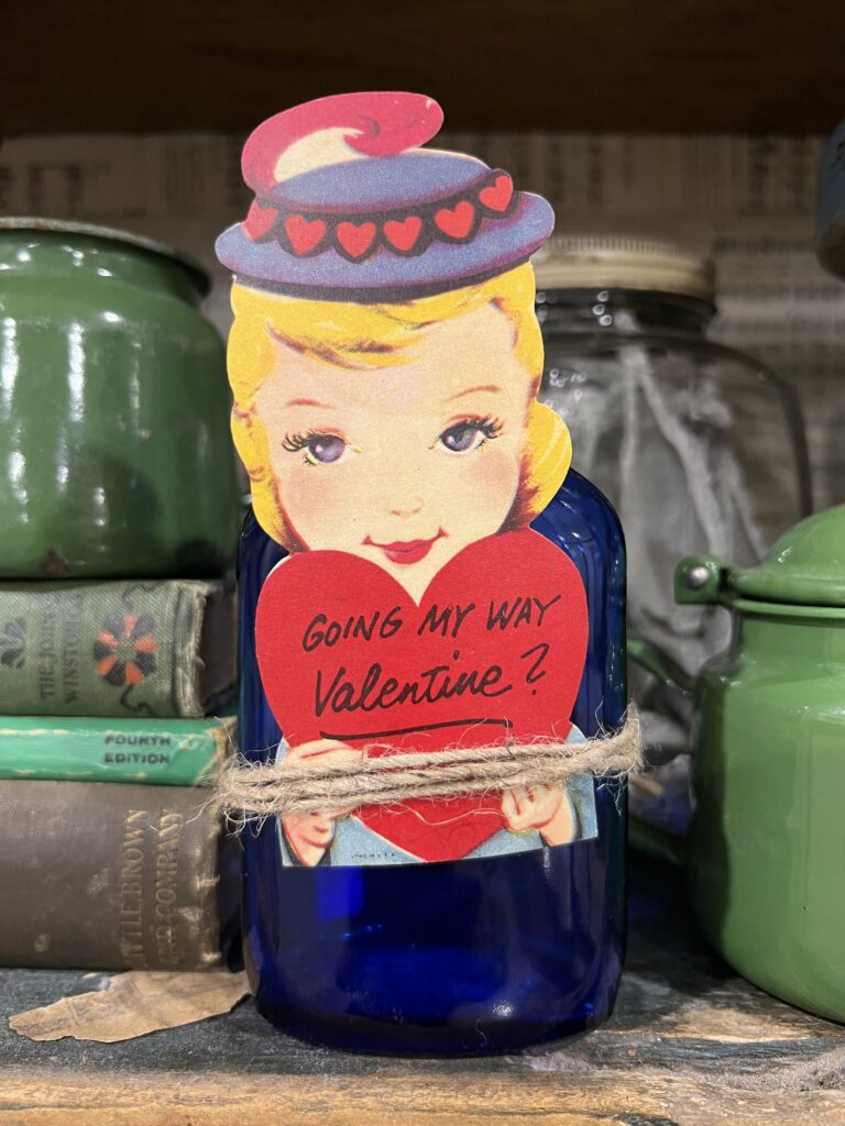 Valentine wrapped around a bottle with twine
