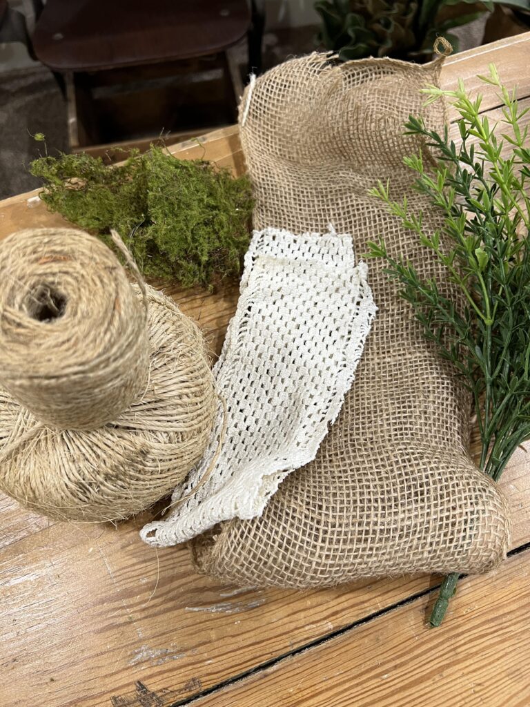 Yarn, doilies, burlap, moss...all things you could wrap an egg in.