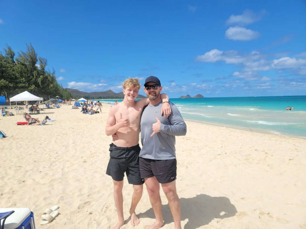 last day of vacation photo on Oahu of Matt and our youngest